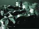 Black & white image of the quartet performing