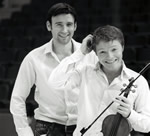 Artists standing one in fornt of the other in white shirts holding a violin