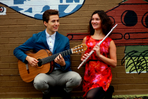 Meraki Duo seated with their instruments